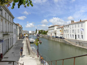 Cyclist on the dock at Marans