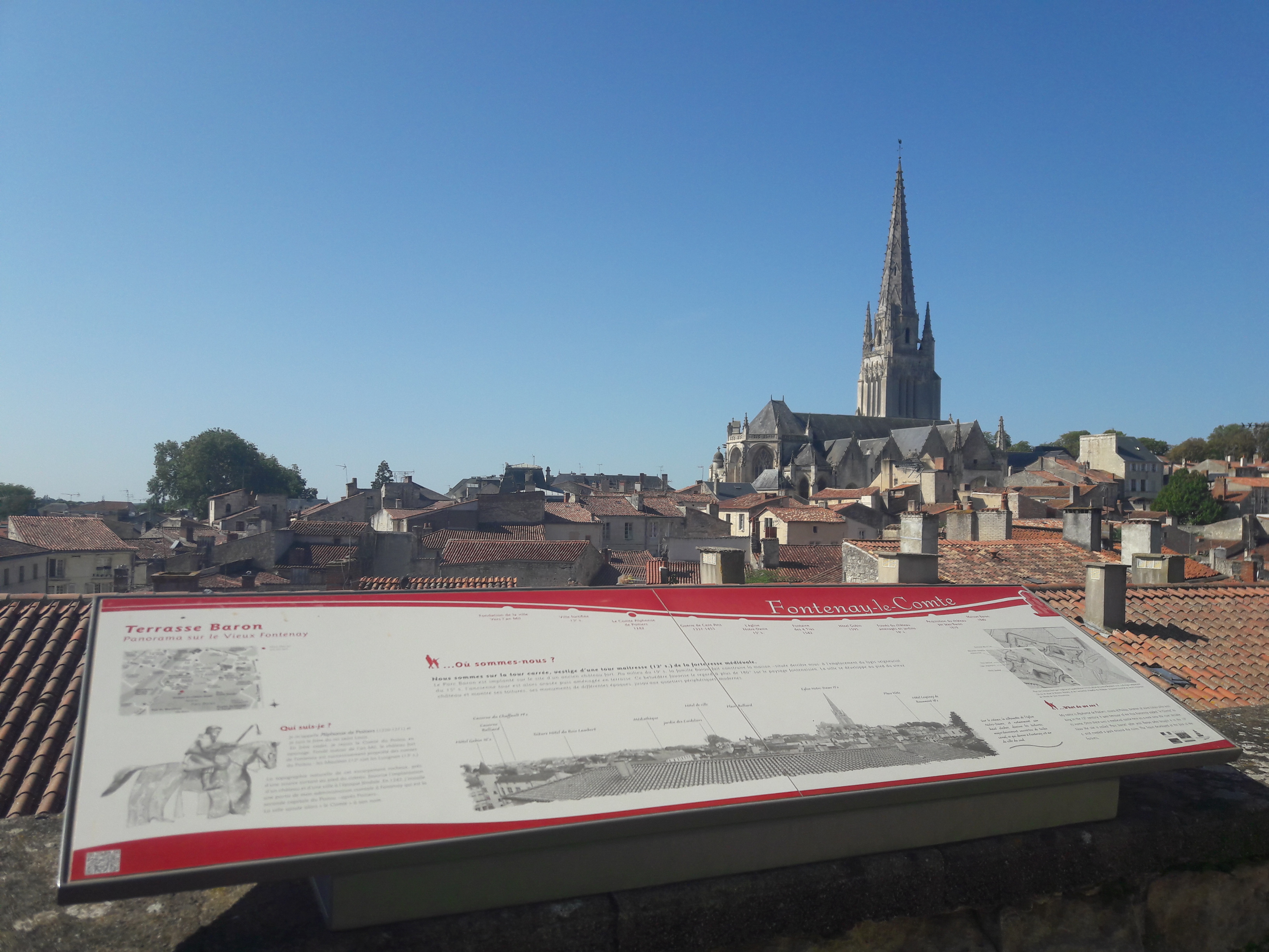 The monuments and roofs of the city of Fontenay le Comte in the Marais poitevin regional nature park.